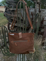 Mahogany Tooled Leather Hair On
